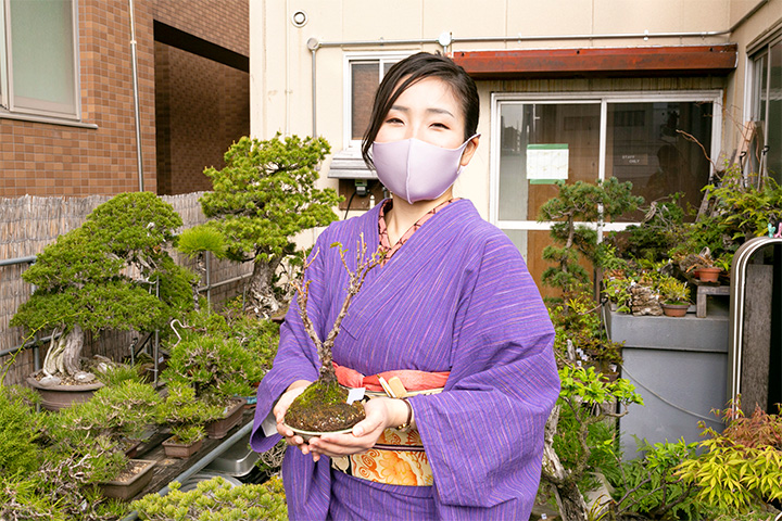 With my Crimson Glory Vine Bonsai